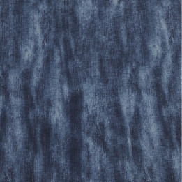 Denim color with a distressed feel on the navy blue print